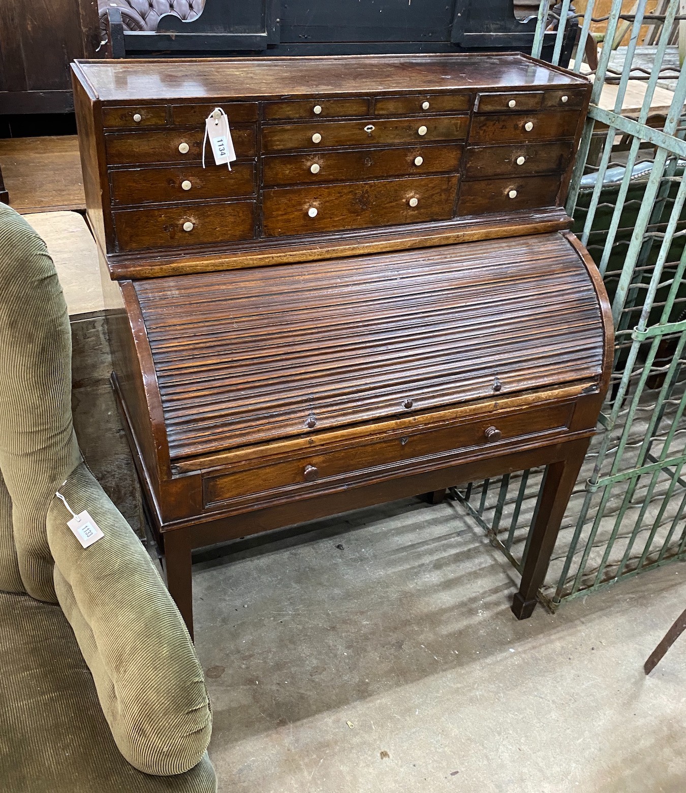 A George III mahogany cylinder bureau with fifteen drawer superstructure, width 92cm, depth 51cm, height 122cm